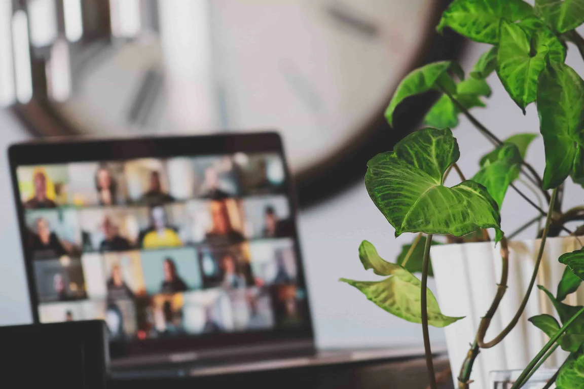 a laptop showing an online video call