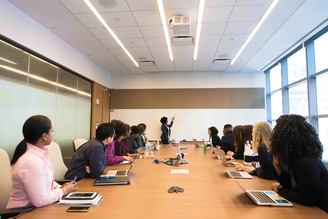 employees around a boardroom table