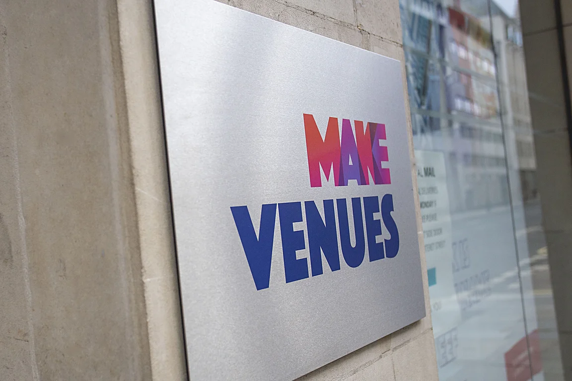 make venues plaque on a wall