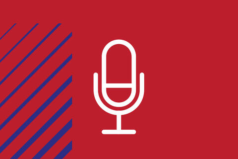 White microphone icon over a red background.