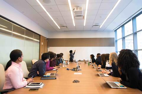 employees around a boardroom table