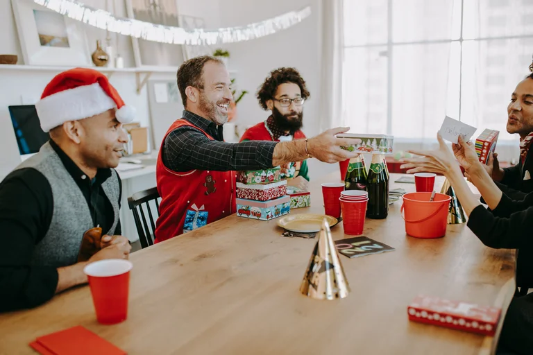 group of people doing a Christmas activity 